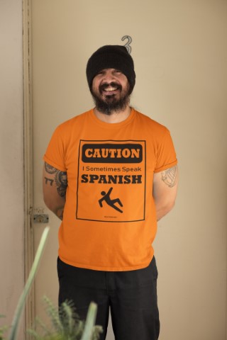 Caution I Sometimes Speak Spanish Bright Orange T-shirt by Sanchez Here