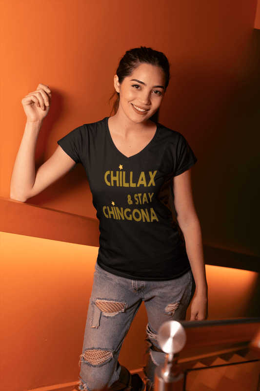 Black V-neck t-shirt with the text, "Chillax Y Stay Chingona" in streetwear font and yellow ink. This sexy tee comes in sizes small thru 3XL. It is available at www.sanchezhere.com