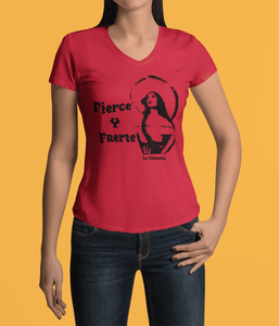 Red V-neck t-shirt with the text, "Fierce Y Fuerte La Chingona" in black ink and a Mexican woman with a sombreo and bullet strap also in black ink. This sassy tee comes in sizes small thru 3XL. It is available at www.sanchezhere.com