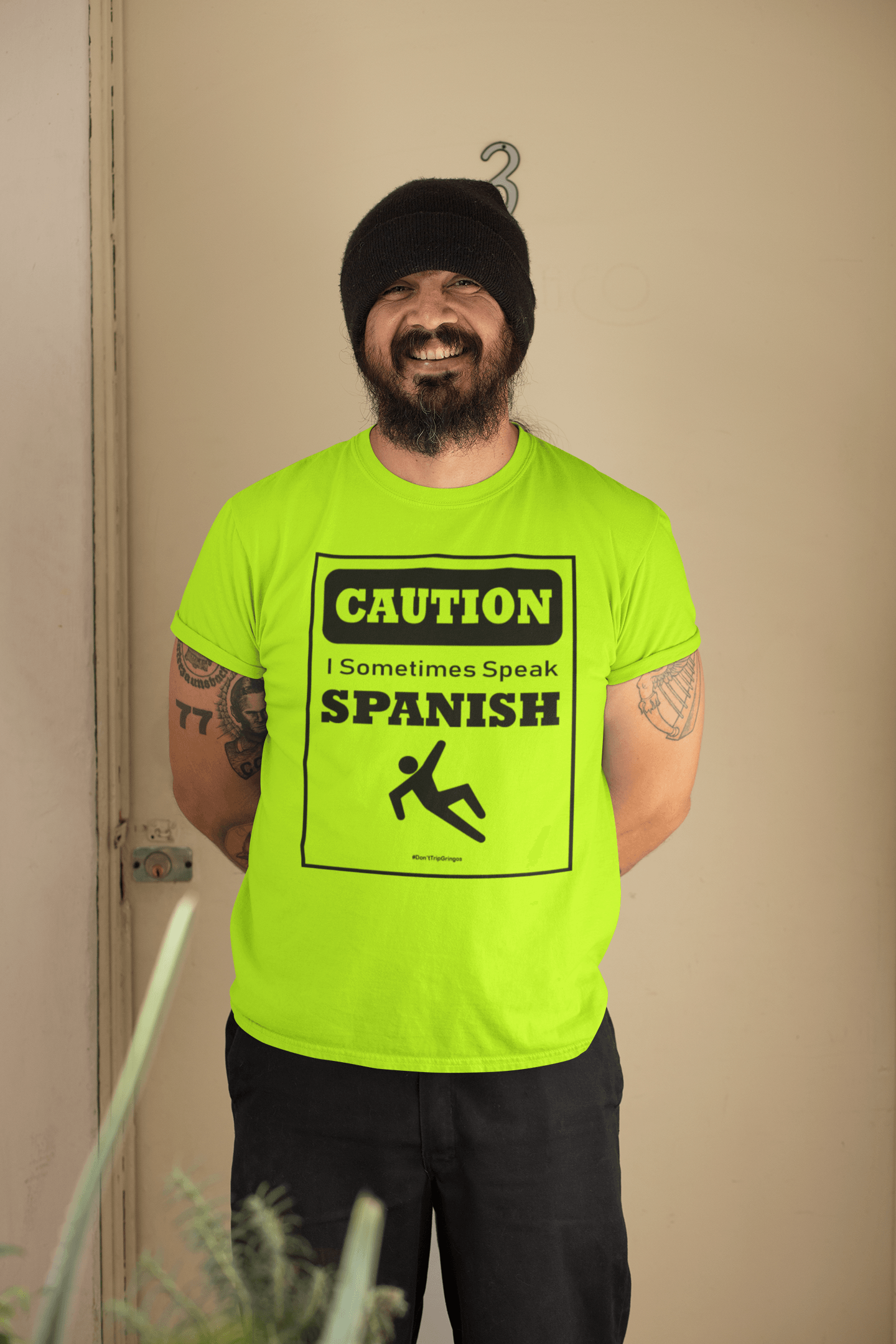 Lime Green t-shirt with black text and design that reads, "Caution I sometimes speak Spanish #Don'tTripGringos " in a caution sign layout. It is available in sizes SM-4XL at www.sanchezhere.com