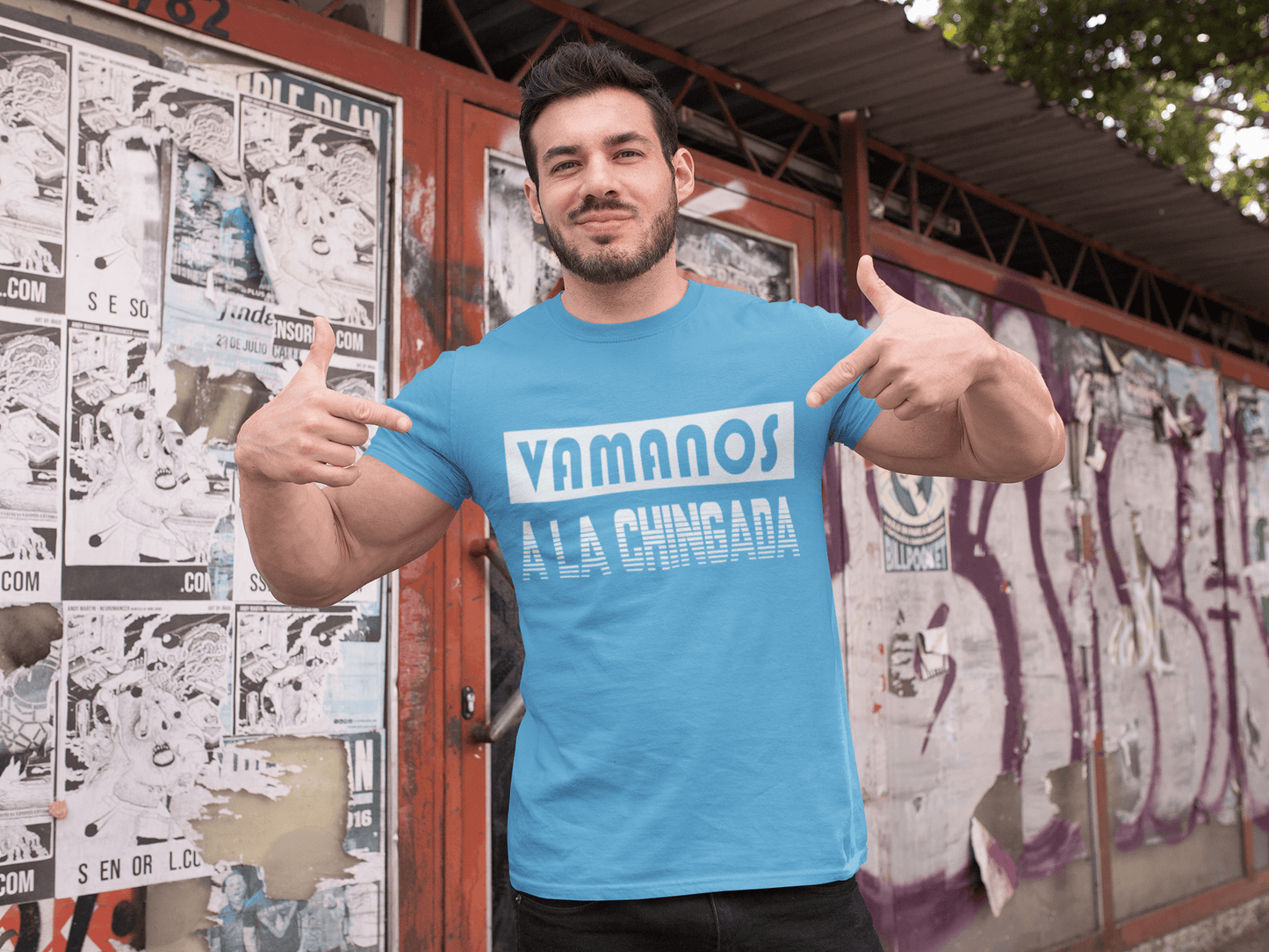 Light Blue T-shirt with text, Vamanos A La Chingada in white. This tee is available in sizes, small thru 4XL and is available at www.sanchezhere.com